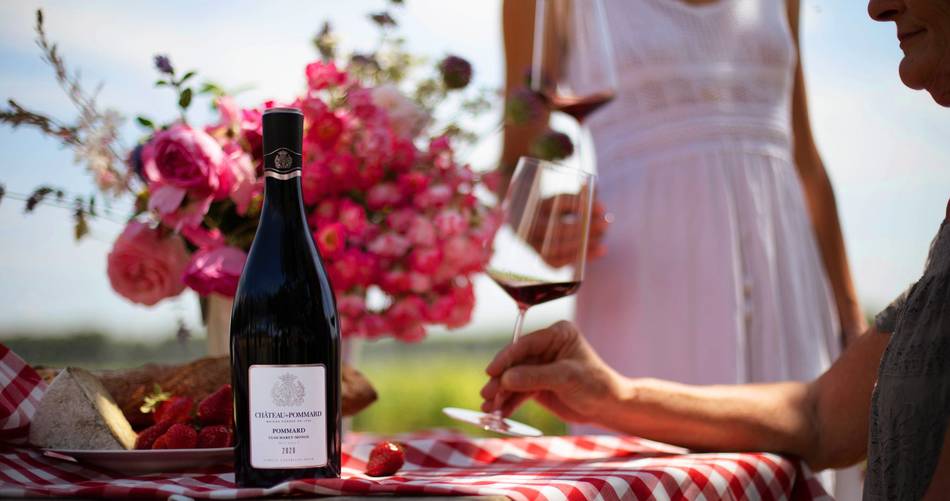 Château de Pommard Wine Tasting Tour wine barrels and tasting area.